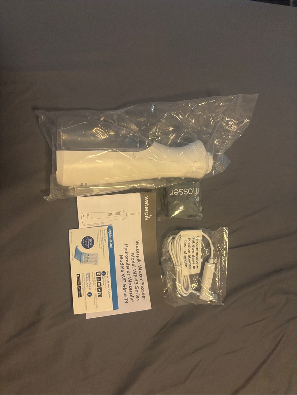 Waterpik White Portable Water Flosser including Handle and Accessories